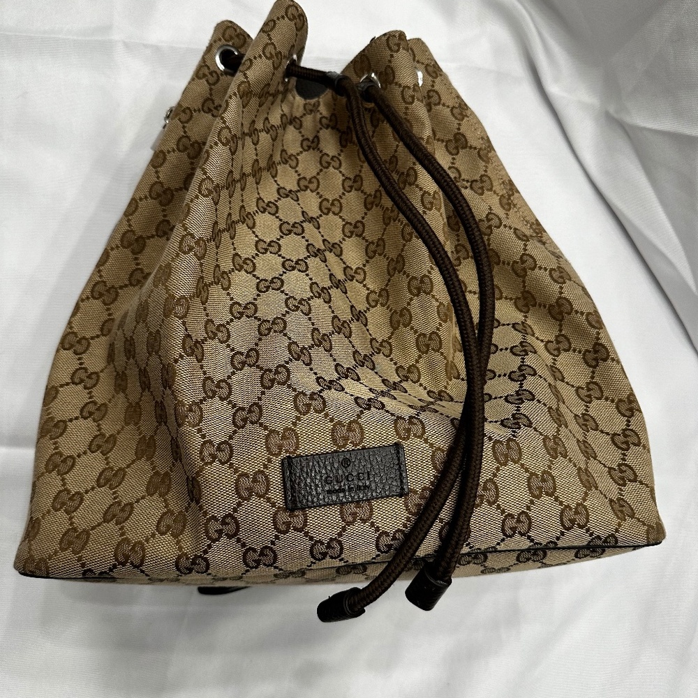Sold!! Gucci GG Drawstring Backpack